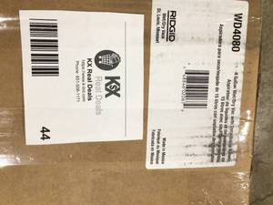 lot 44 image: Ridgid 4 Gallon 6.0 Peak HP WetDry Shop Vacuum with Detachable Blower customer Return see pictures