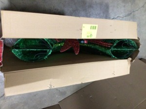 lot 15 image: Home Accents Holiday 3 ft Green Twinkling LED Tinsel Wreath Yard Sculpture