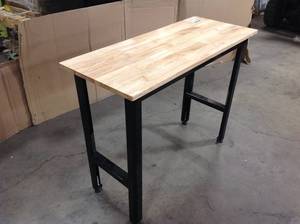 Husky 4 ft. Solid Wood Top Workbench in Black see pictures