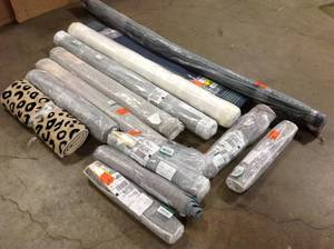 Lot of assorted Rugs various sizes not used see pictures