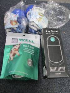 lot 245 image: 2 Dog Toys, Supplements, Water Bott...