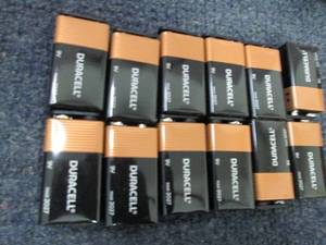 lot 354 image: 12 - 9 Volt Duracell Batteries...