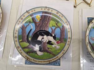 lot 635 image: Fridays Toon Loves Sneaking Around Collectors Plate