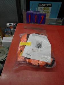 Orange safety fall harness. New in box. As shown.