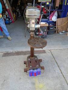 Champion bench size drill press. Good used condition. Tested & works. No key. As shown.