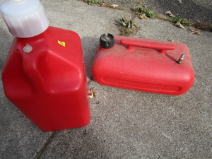lot 93 image: OB & Racing Fuel Cans