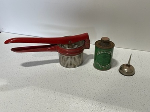 lot 40 image: Vintage Potato Ricer, Nor-V-Gen Shoe Oil Can