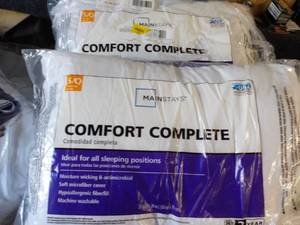 lot 6 image: 2 Comfort Complete Size SQ Pillows...