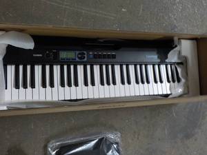 lot 108 image: Casiotone CT-S190 and Carrying Case...