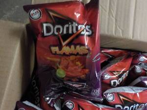 lot 252 image: Case of Doritos Flamas Chips...