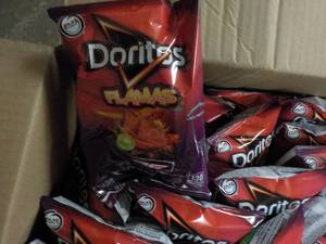 lot 253 image: Case of Doritos Flamas Chips...