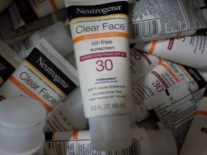 lot 324 image: Banana Box Full of Neutrogena Clean...