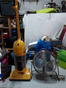 lot 49 image: Eureka 12 Bagless Upright Vacuum (Works) & Montgamery Wards Cage Fan (Works)