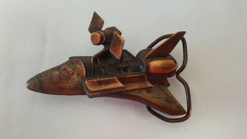 lot 26 image: NASA Belt Buckle Space Shuttle. 1982