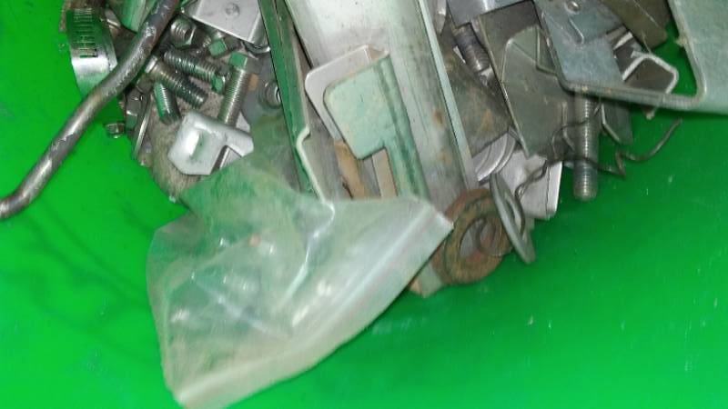 lot 38A image: Tow hooks and bucket of hardware.