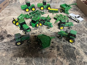 John Deere 164 size tractors and equipment