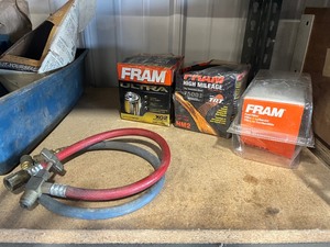 flat of new car parts