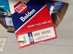 Box of new car parts
