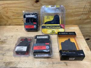 lot 43 image: Lot of Gun HolstersRelated