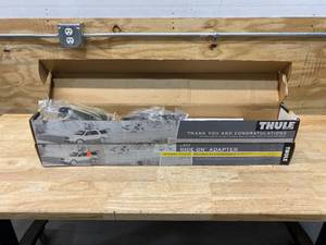 lot 57 image: THULE Lot of 4- Ride On Adapters