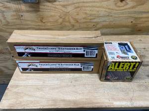 lot 59 image: Lot of 2 TruckClaws II Extender Bars and Lippert 87120 Correct Track II Trailer Axle Alignment Kit Single Axle