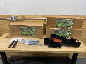 lot 114 image: EzStorHitch Lot of 3- Complete Hitch and Spring Bar Storage Systems
