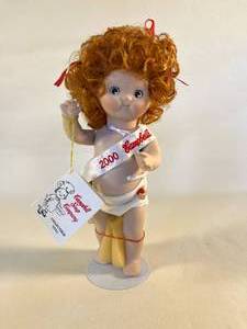 lot 22 image: complete Campbell Kid doll collectible in can - never used