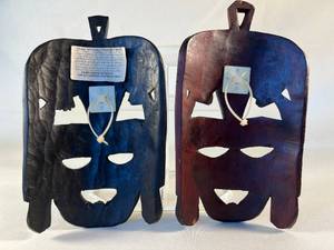 lot 31 image: pair of decorative tribal masks from Kenya