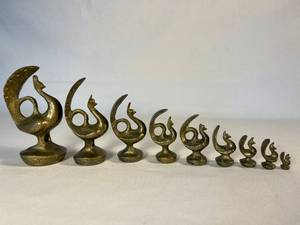 lot 32 image: carved brass opium weights (9)