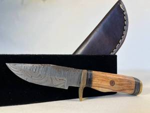 lot 34 image: Damascus knife with sheath