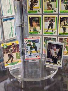 Binder full of Hockey 1976-77 & 1990-91 Minnesota North Star Player Cards including Mike Modanos Rookie Cards