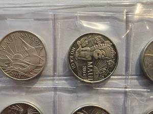 (27) Maui NO KA OI Trade Dollar Coins