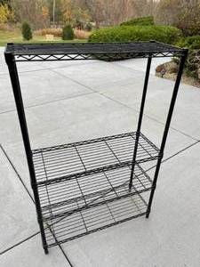 lot 238 image: 4 Shelf Metal Garage Storage Rack