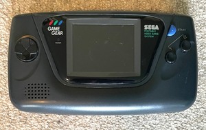 lot 64 image: Sega Game Gear with 4 Games