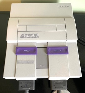lot 75 image: Nintendo Super Nes Control Deck, Game and Controllers