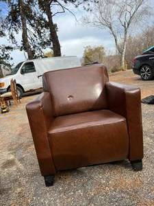 lot 25 image: Brown Leather Chair