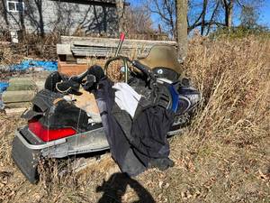 lot 183 image: Polaris Snowmobile with Cover and Sleds