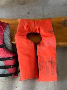 lot 166 image: Log Bench with Fishing Poles and Life Jackets