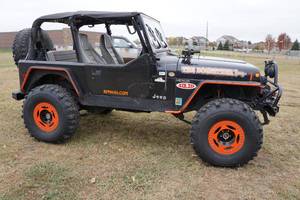 lot 3 image: 1994 Jeep Wrangler TJ - 102k Miles - 36 Swampers, 9500 Lb Winch, Many Extras