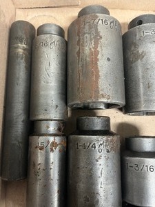 lot 63 image: Assortment of 12 drive MAC Impact Sockets SAE
