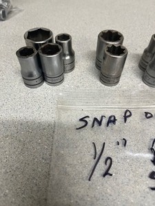 lot 61 image: Assortment of 12 drive Snap-On Sockets 12pt.