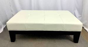 lot 69 image: White Leather Ottoman by Safavieh