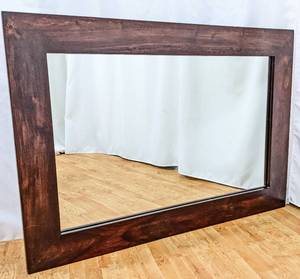 lot 109 image: World Market Dark Wood Framed Mirror - Hangs Horizontally or Vertically