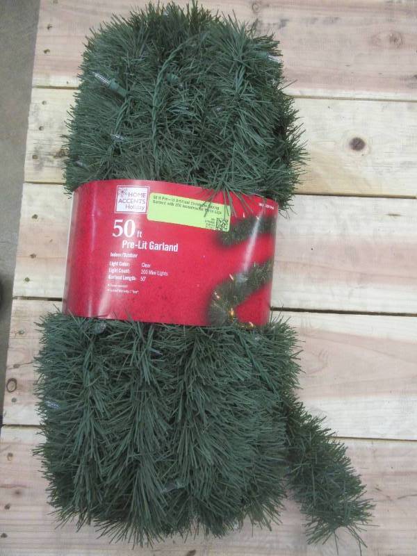 lot 802 image: Home Accents 50 ft Pre-lit Artificial Christmas Roping Garland with 200 Incandescent White Lights, GIZ5GB094C06 - SOLD AS IS