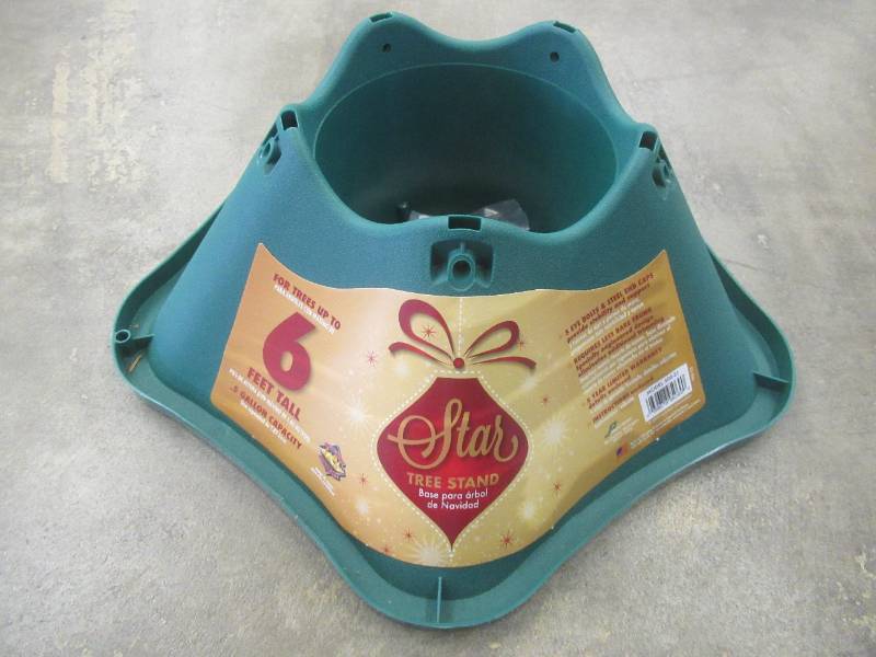 lot 430 image: Jack Post Resin Tree Stand for Live Trees Up to 6 ft. Tall, 506-ST - SOLD AS IS