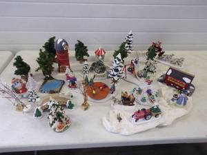 lot 68 image: Assorted Christmas Village Items includes Christmas Silo