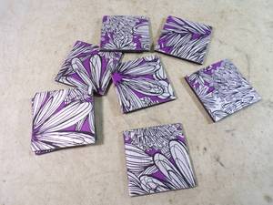 lot 87 image: 8 one of a Kind Vining Purple Palace Coasters From the Iconic Purple Palace Wallpaper