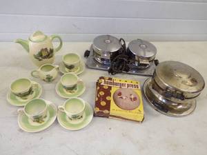 lot 117 image: Vintage Clarice Cliff Tea Set No Chips or Cracks with Vintage Waffle Iron and Other Kitchen Items