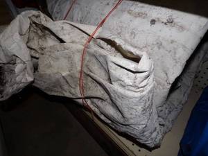 lot 124 image: Large Tarp Good for Woodpile may have rips and holes White