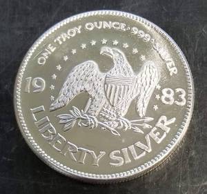 1 TROY OZ .999 FINE SILVER 1983 A-MARK LIBERTY ROUND